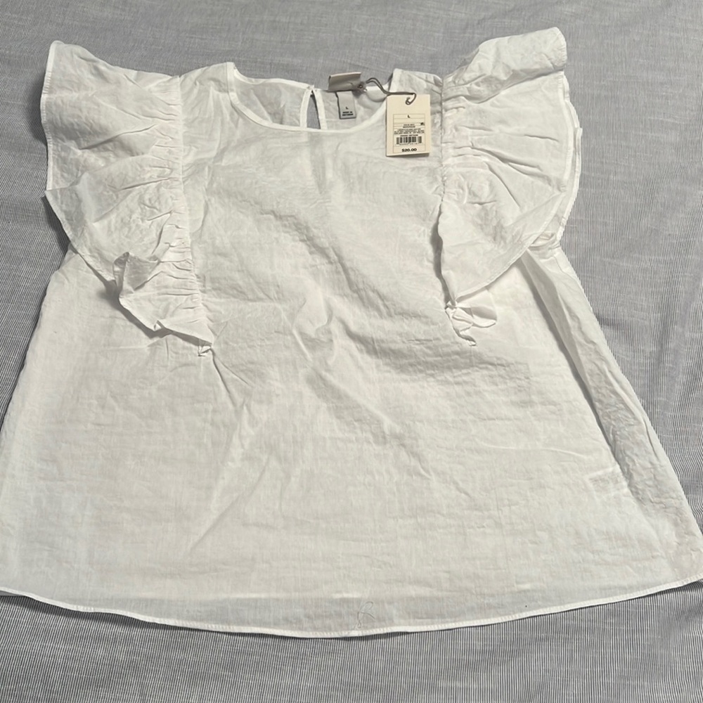 A New Day white ruffle sleeveless blouse